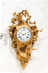 A Louis XV Gilt Bronze Cartel Clock