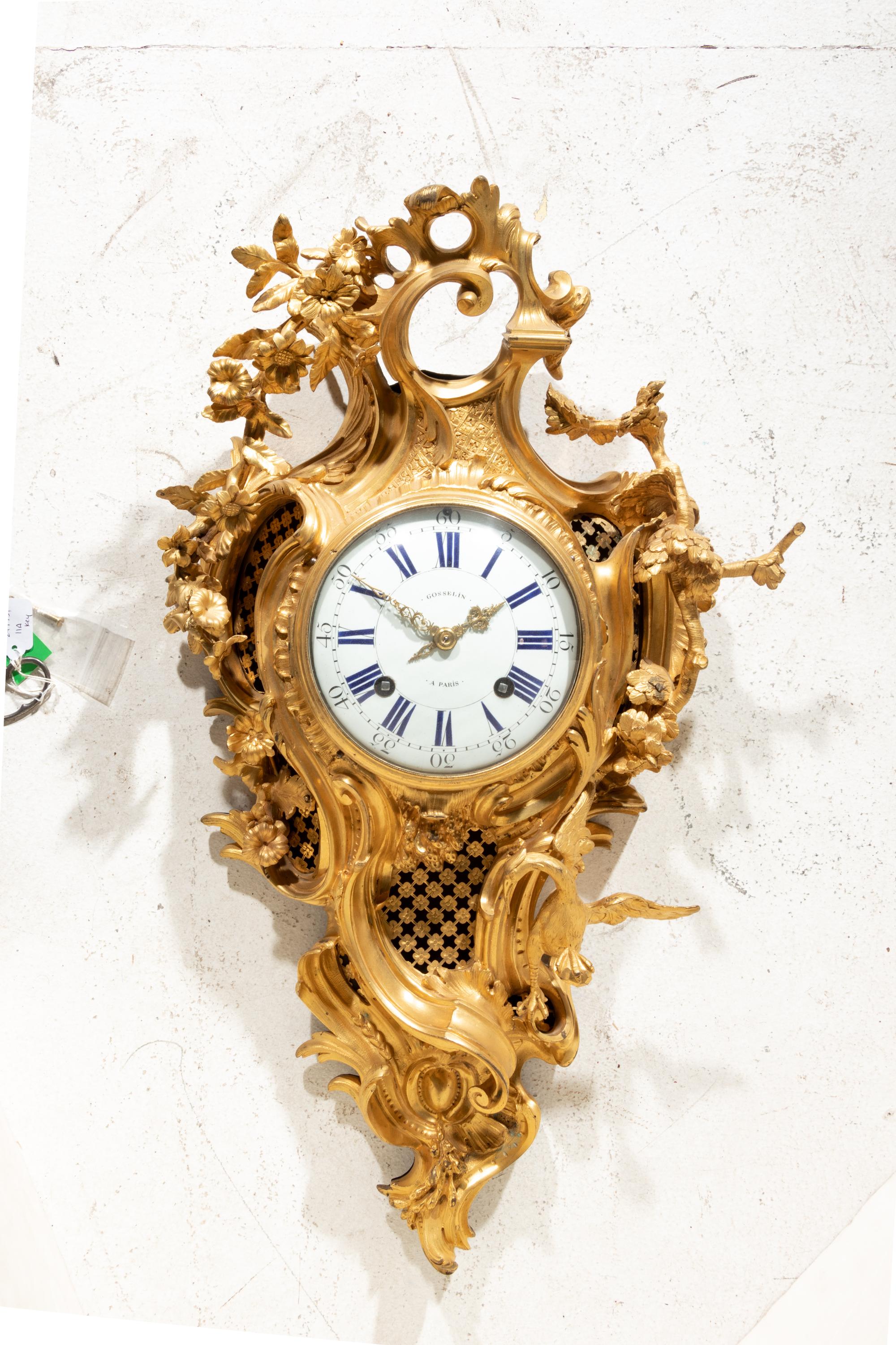 A Louis XV Gilt Bronze Cartel Clock