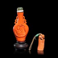 Two Chinese Red Coral Scholar's Objects, 19th-20th Century 晚清-民國 紅珊瑚鼻煙壺及獸鈕章