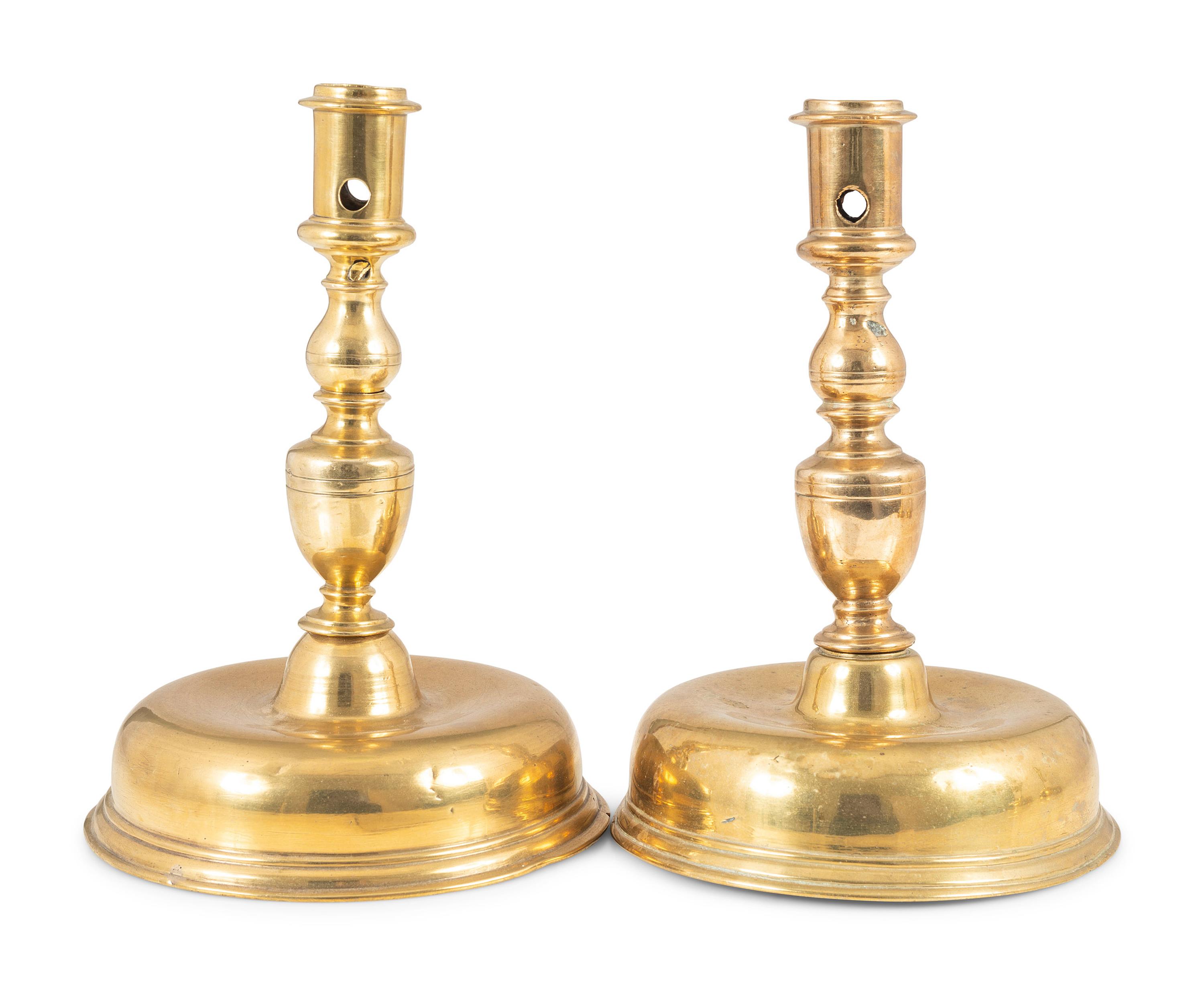 A Matched Pair of Continental Bell-Bottom Brass Candlesticks