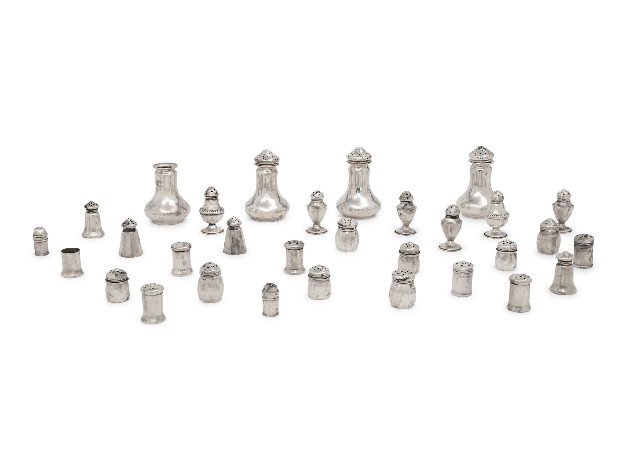A Large Collection of Silver Casters