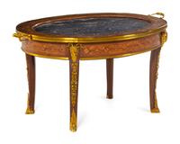 A Louis XVI Style Gilt Metal Mounted Marquetry Low Table