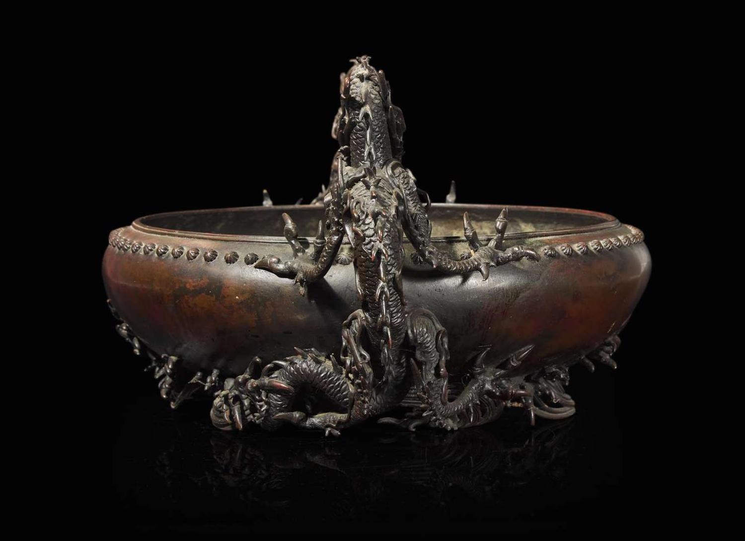 A Japanese patinated bronze "Dragons" jardinière, Meiji period 日本龍紋銅盤 明治