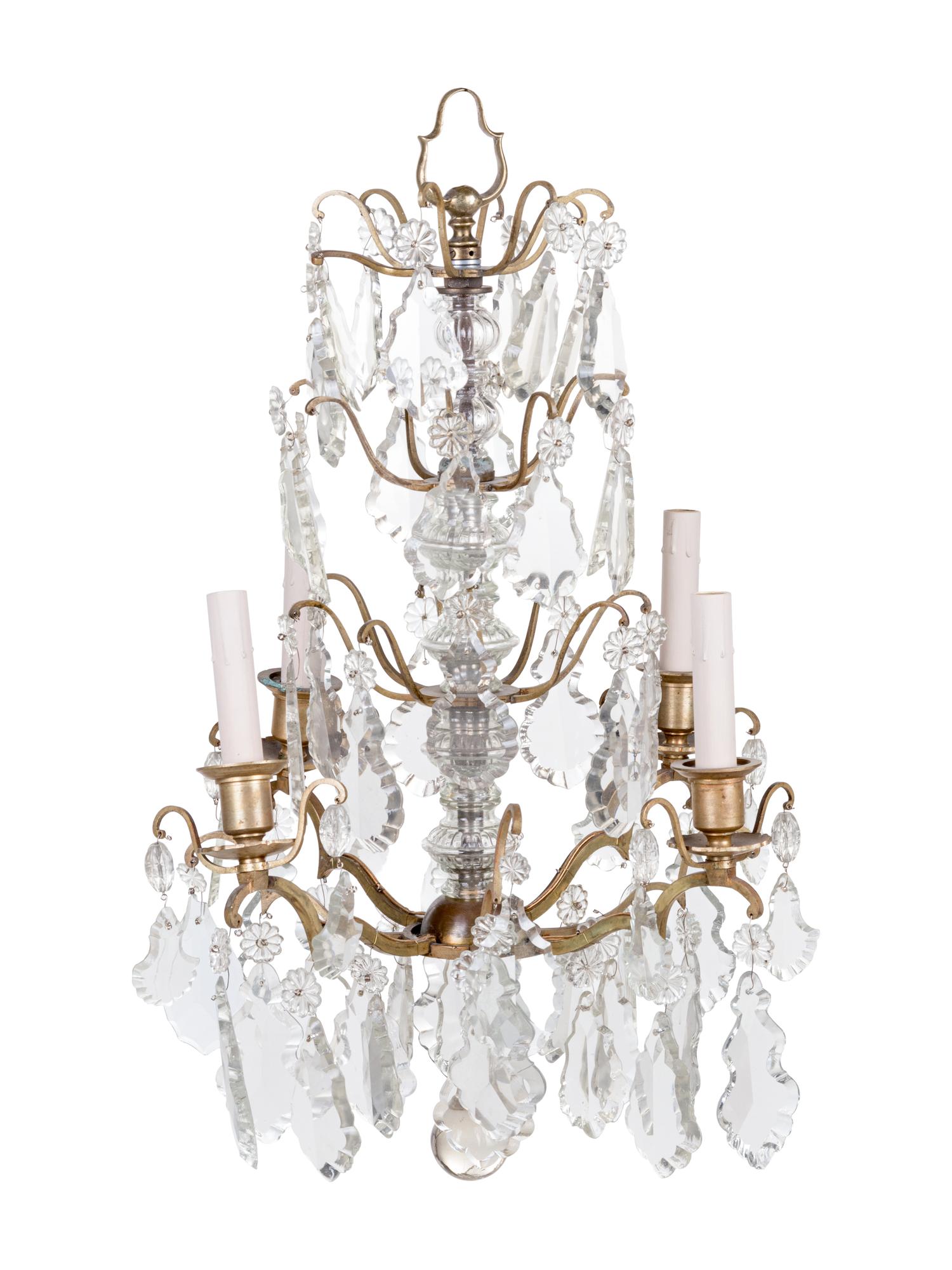 A French Gilt Metal and Cut Glass Four-Light Chandelier