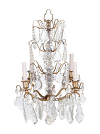 A French Gilt Metal and Cut Glass Four-Light Chandelier
