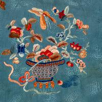 A Chinese Celeste Blue Ground Embroidered Silk Lady's Jacket 清晚期 藍地牡丹花籃紋褂