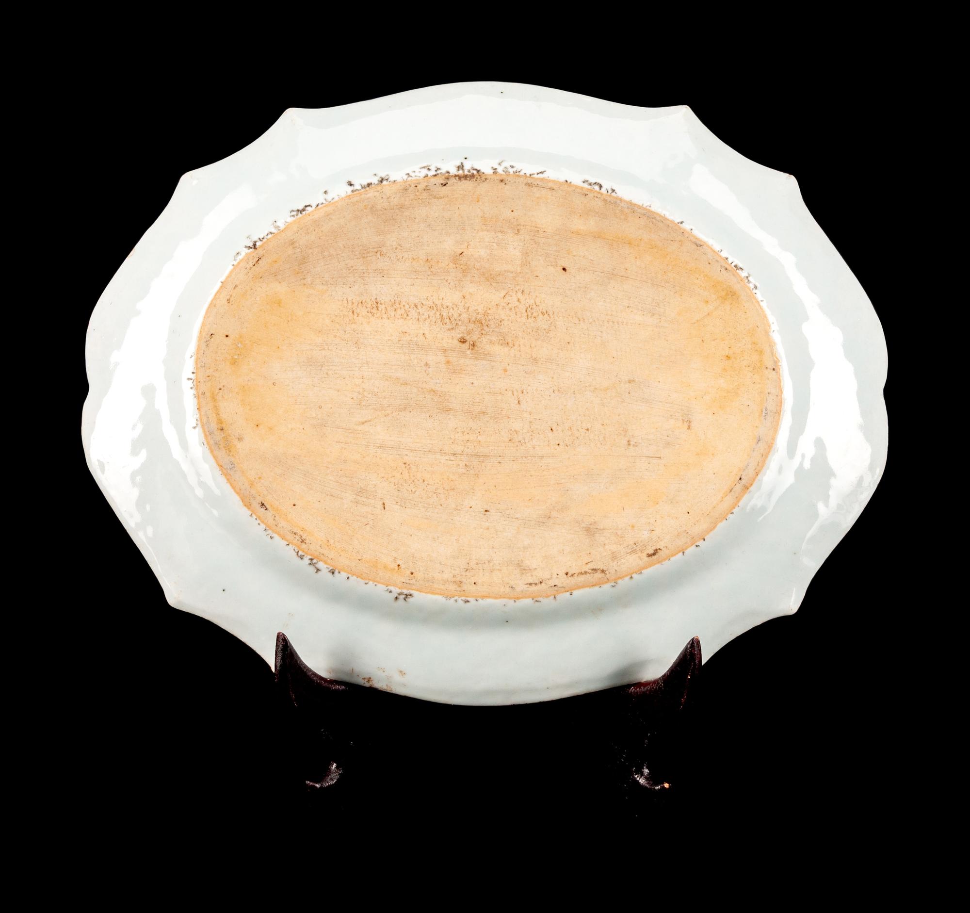 A Chinese Export Porcelain Armorial Oval Platter