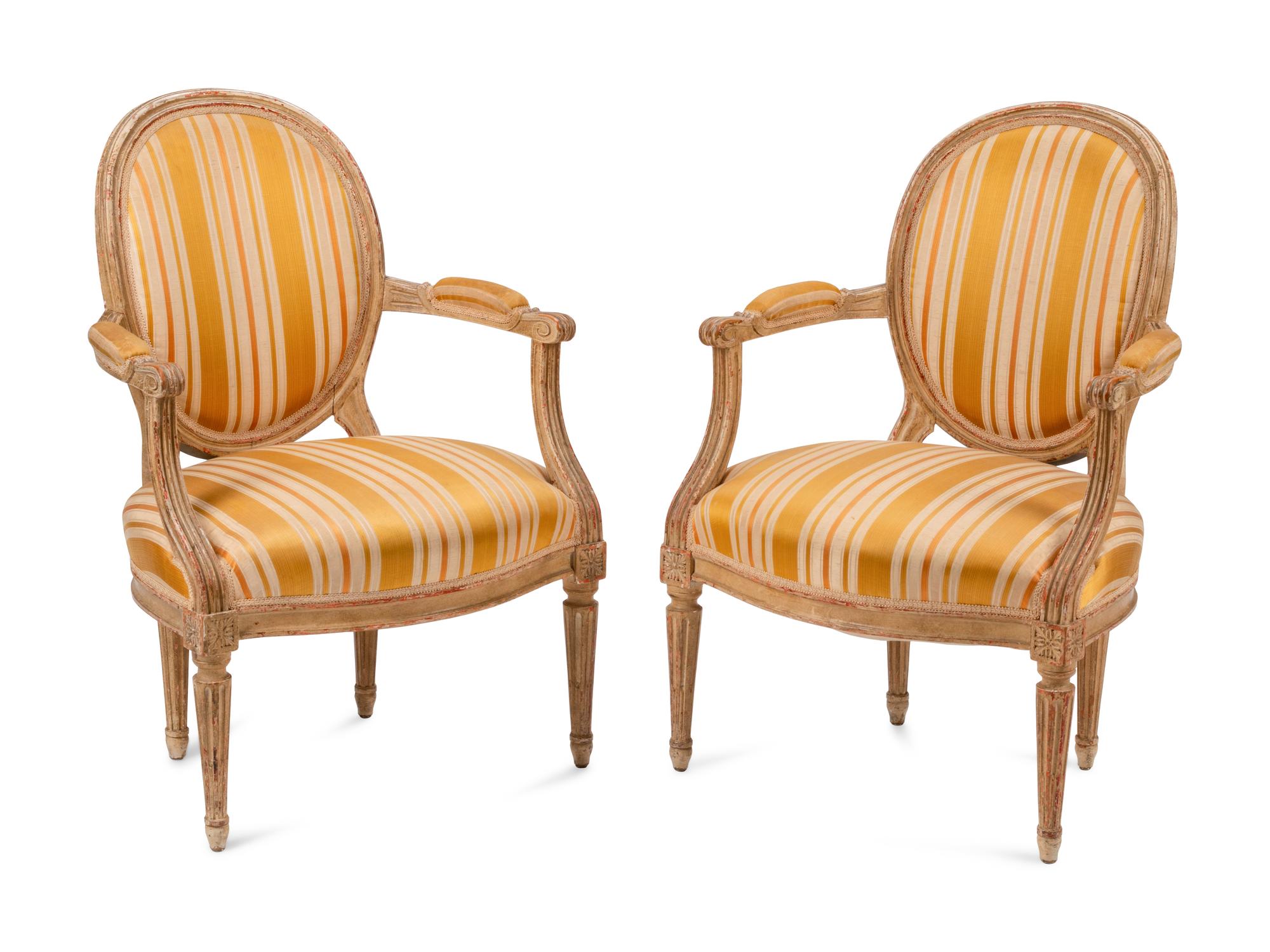 A Pair of Louis XVI Painted Fauteuils
