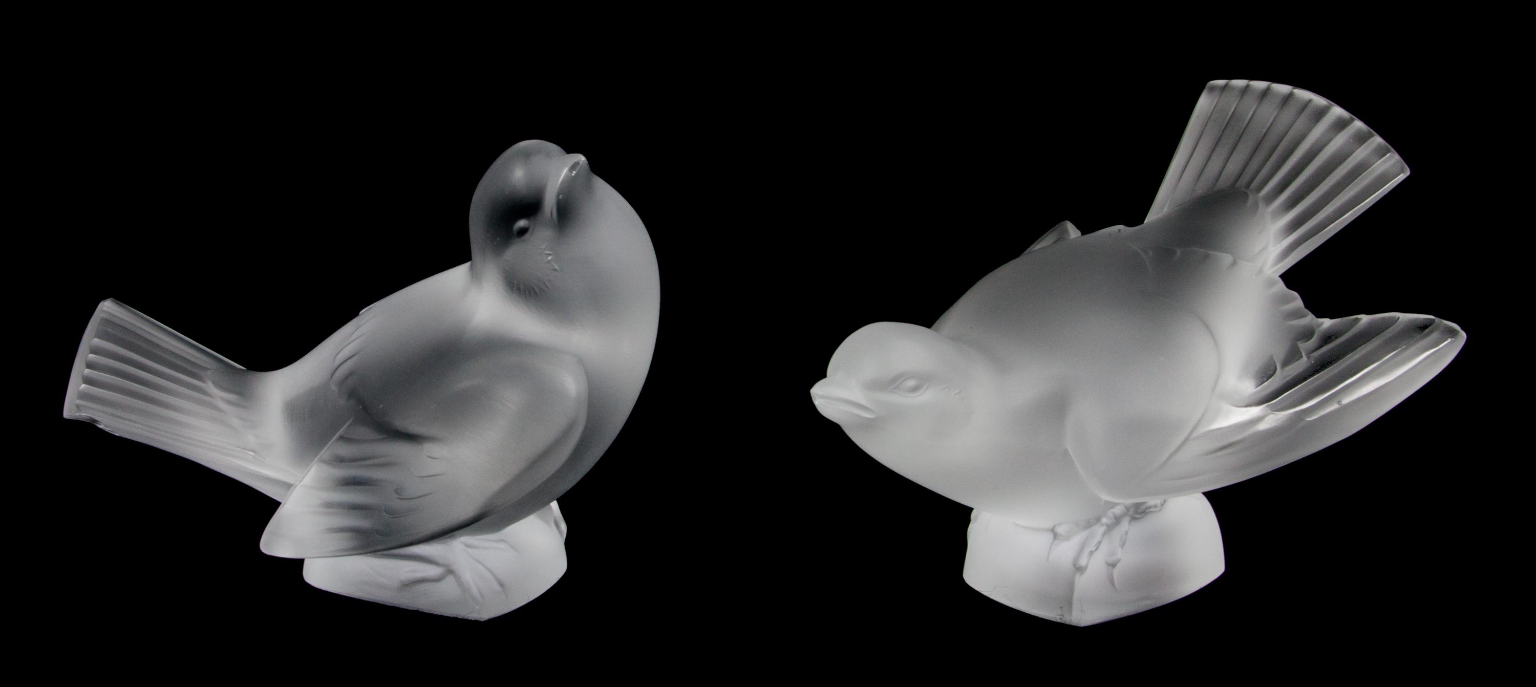Two Lalique Molded and Frosted Glass Figures Height of taller 3 1/2 inches.