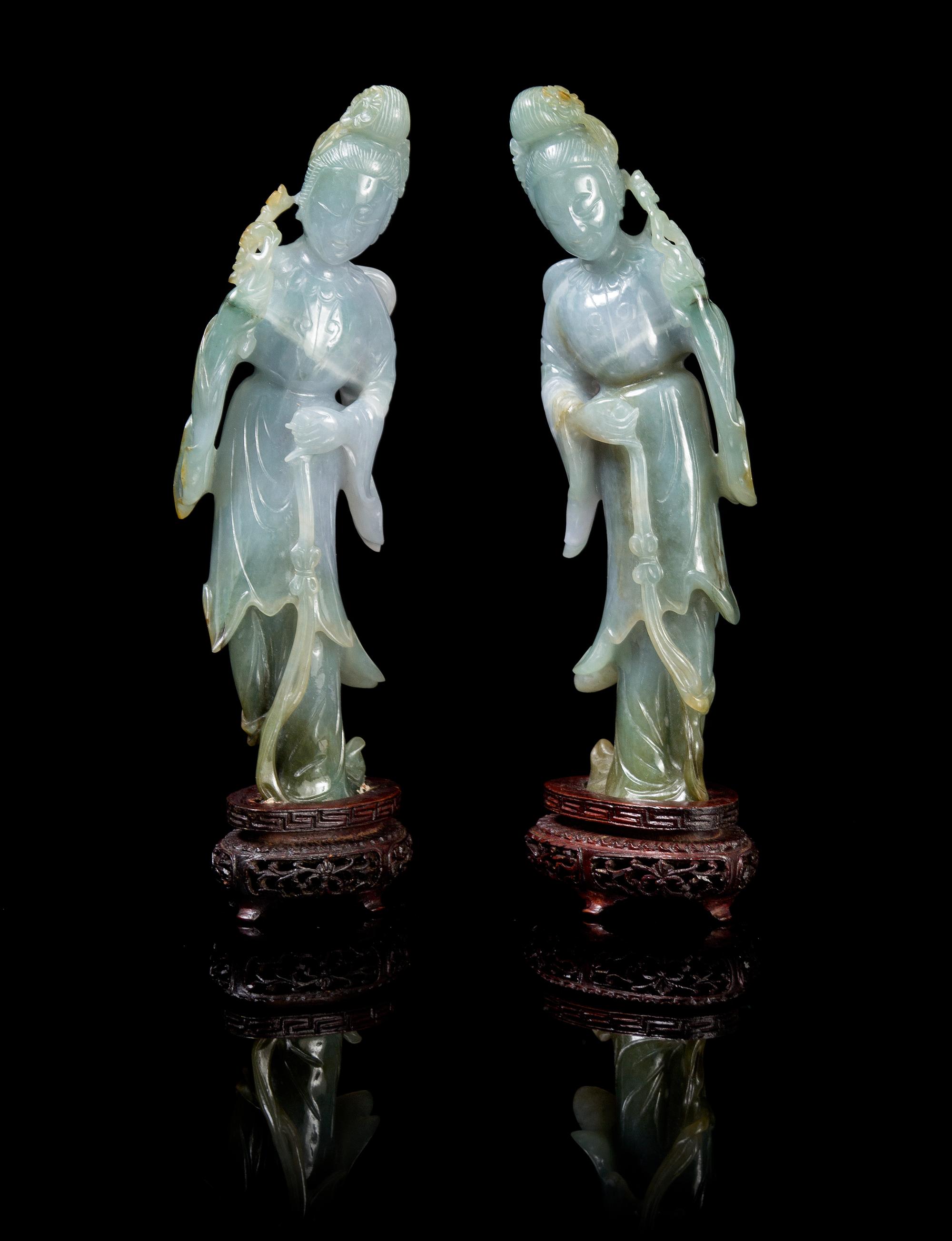 A Matched Pair of Chinese Jadeite Figures of Meirens LATE QING DYNASTY OR LATER Height 7 3/4 x width 2 1/4 inches (with stand). — LATE QING DYNASTY OR LATER