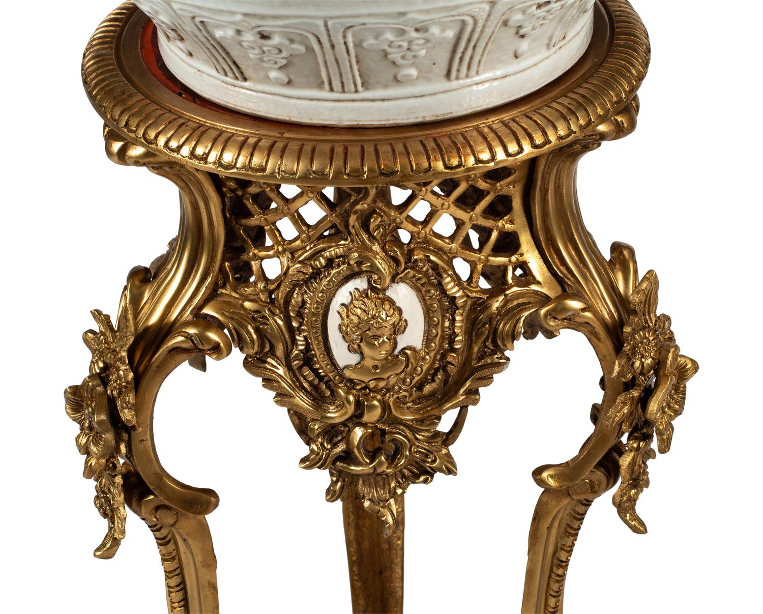 A Pair of Blanc de Chine Porcelain Jars on Gilt Bronze Stands