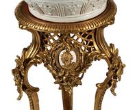 A Pair of Blanc de Chine Porcelain Jars on Gilt Bronze Stands