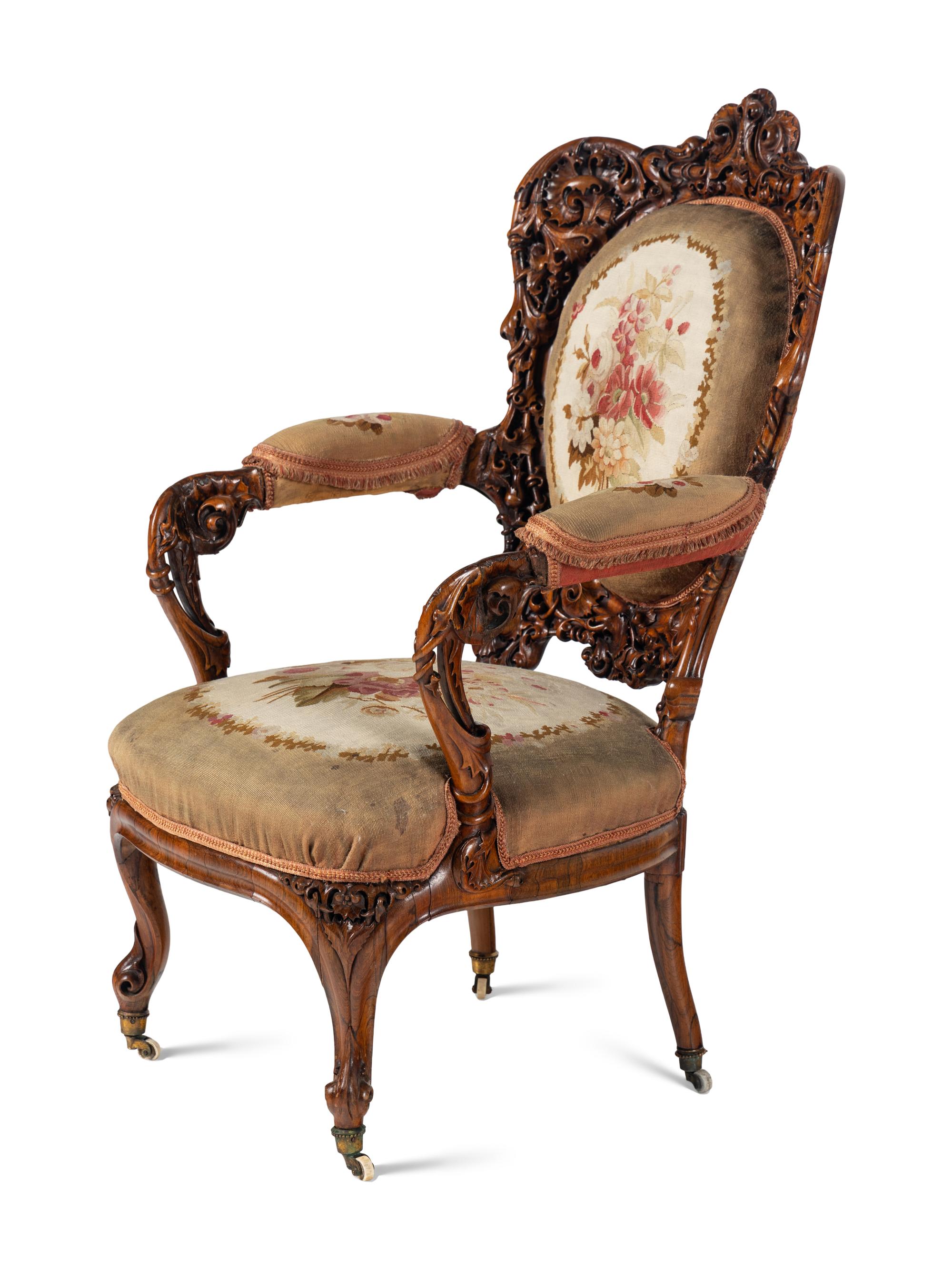A Pair of Rococo Revival Carved Rosewood Armchairs
