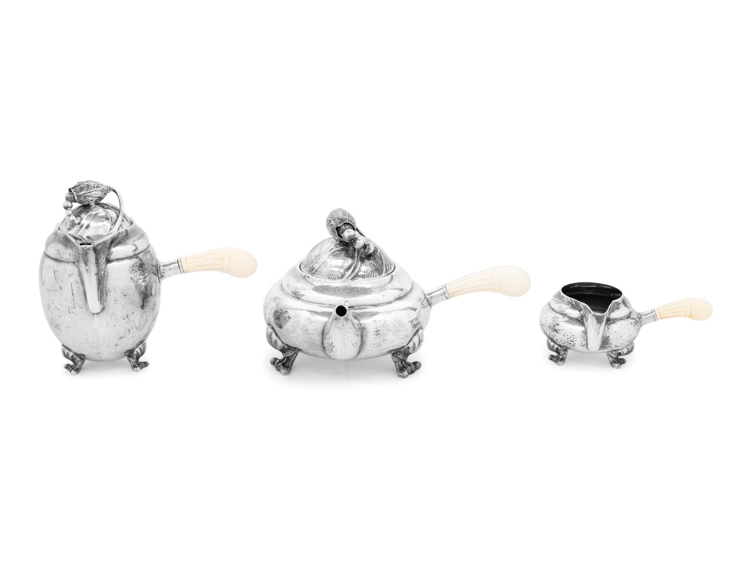 A Georg Jensen Silver Blossom Three-Piece Tea and Coffee Service