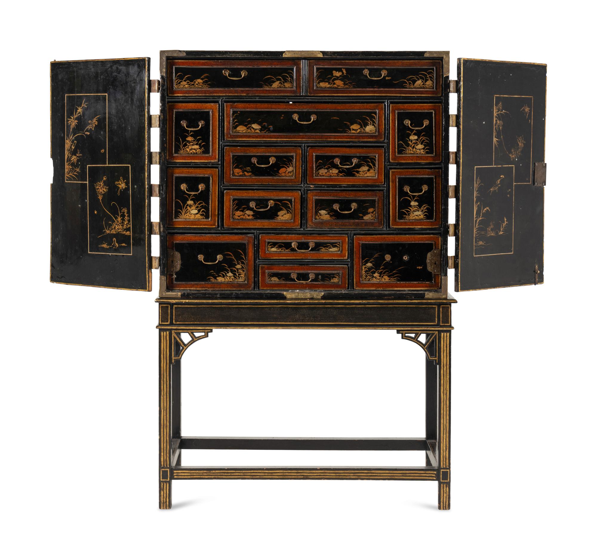 A Japanese Lacquer and Brass Mounted Cabinet on Stand