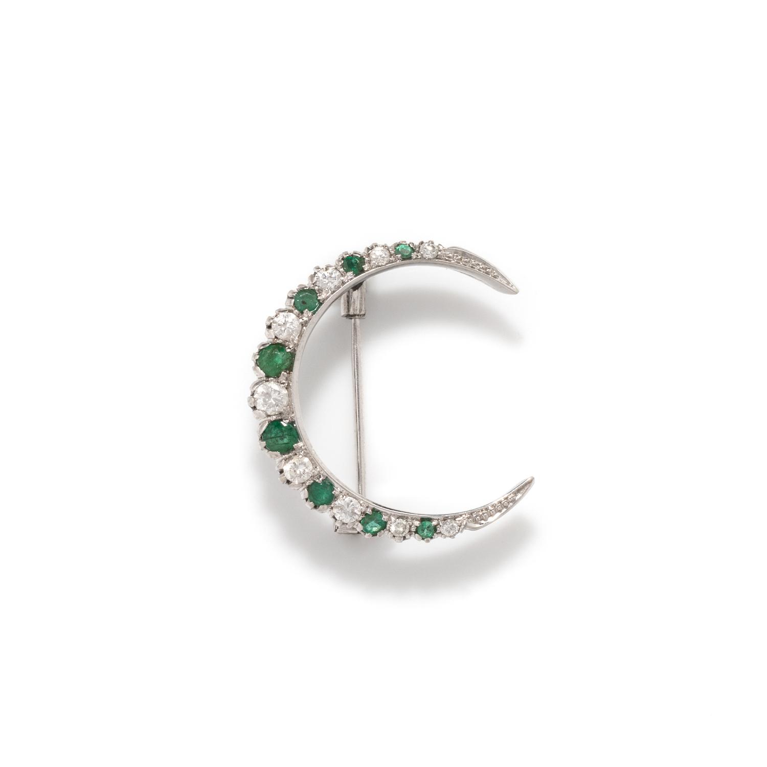 DIAMOND AND EMERALD CRESCENT BROOCH