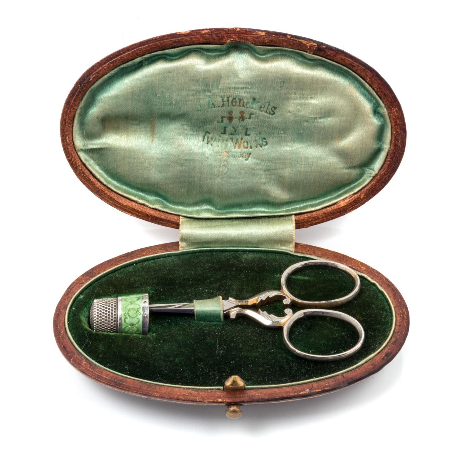 An American Silver and Guilloche Enamel Thimble and Scissor Set, Simons Bros., Philadelphia, PA, the thimble with a green guilloche ena