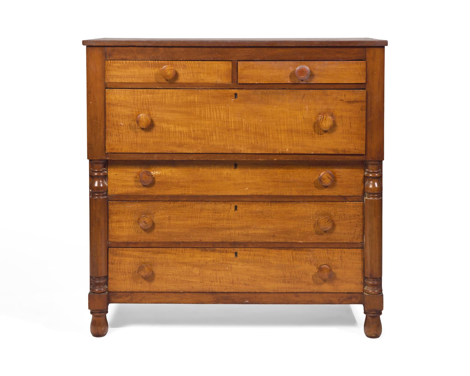 A Late Federal or Classical Cherry and Figured Maple Chest of Drawers