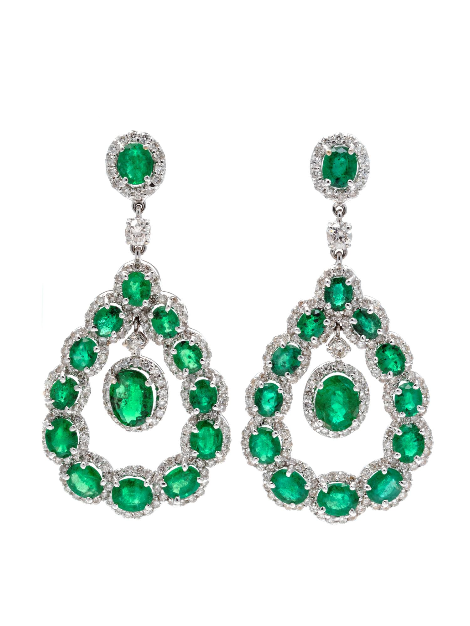 A Pair of 18 Karat White Gold, Emerald and Diamond Earclips,