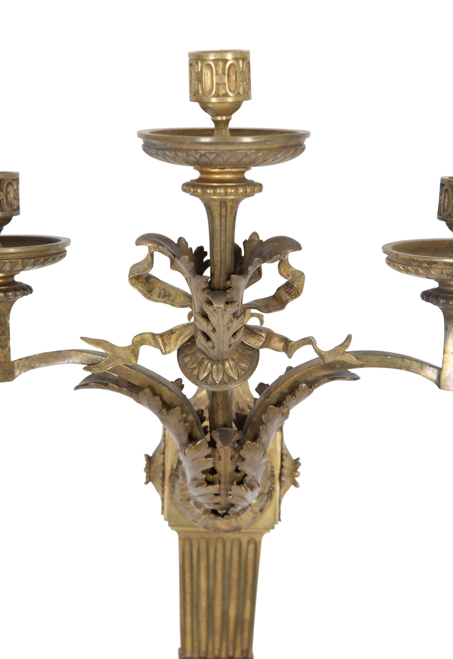 A Pair of Empire Style Gilt Bronze Three-Light Sconces