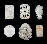 Five Chinese Carved Celadon Jade Pendants