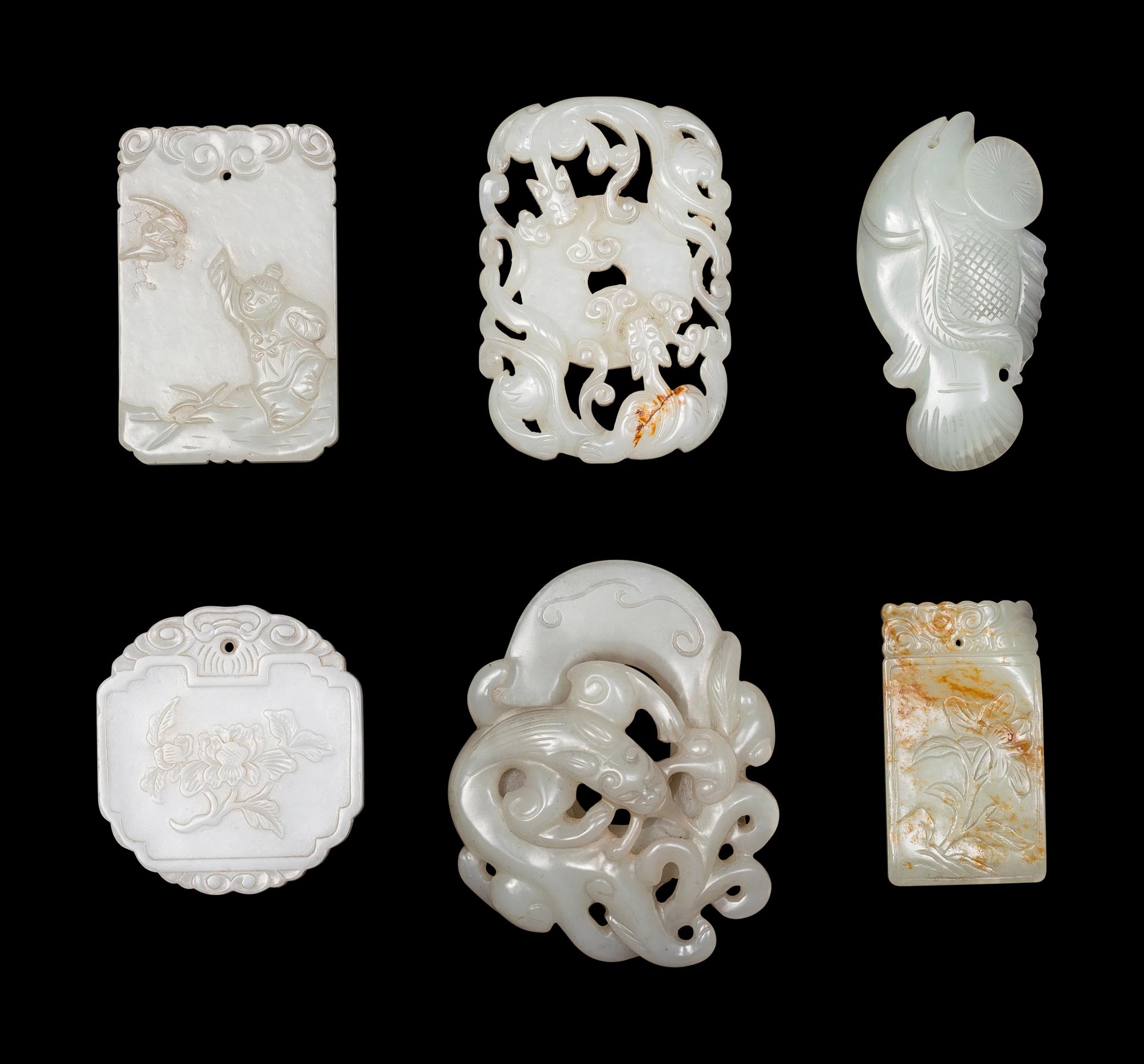 Five Chinese Carved Celadon Jade Pendants