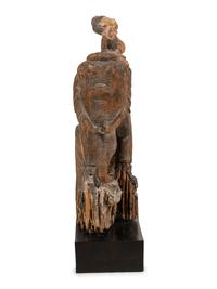 A Southeast Asian Carved and Painted Wood Group of an Elephant and Rider