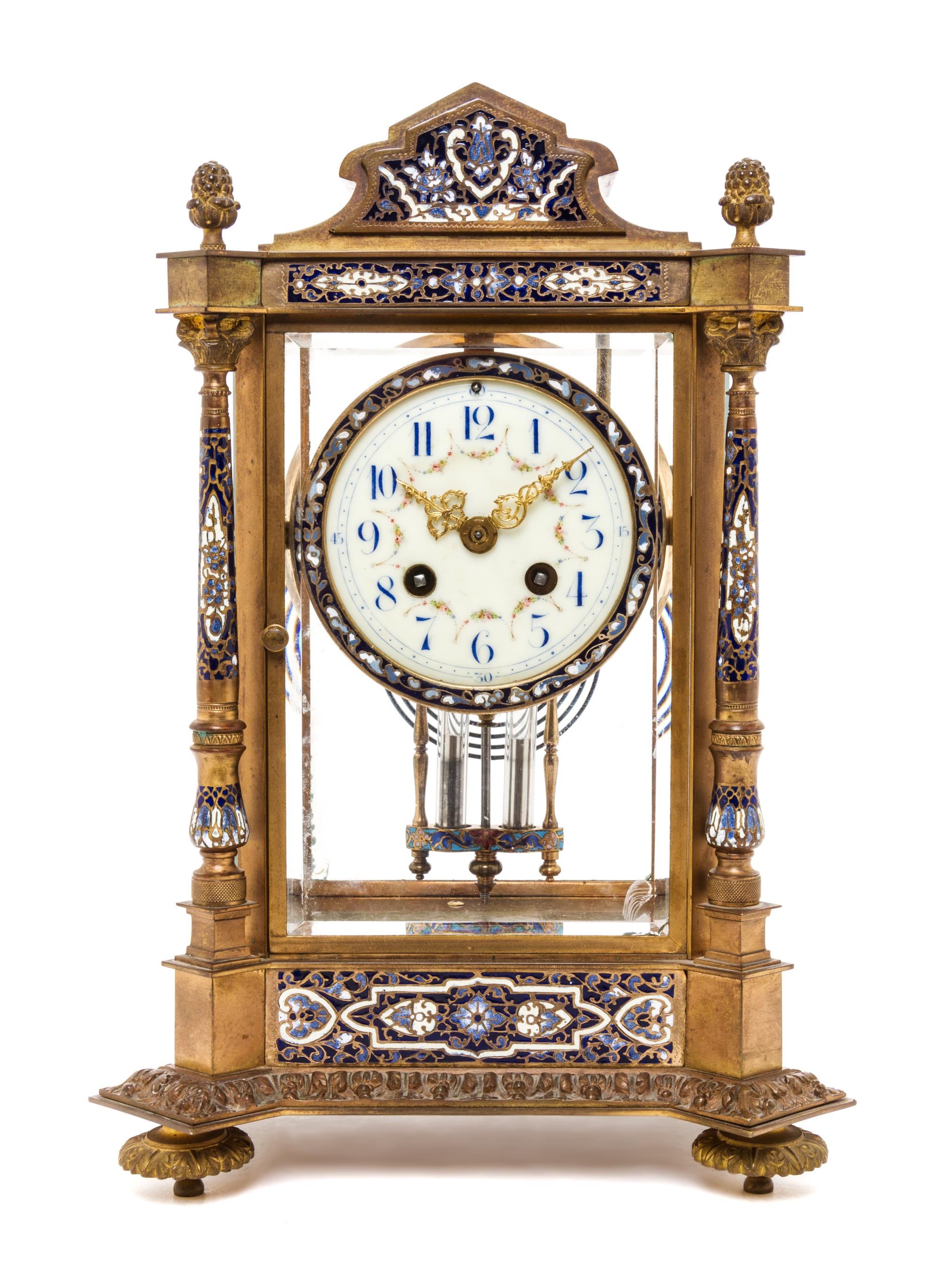 A French Gilt Bronze and Champleve Mantel Clock, Height 13 3/8 inches.