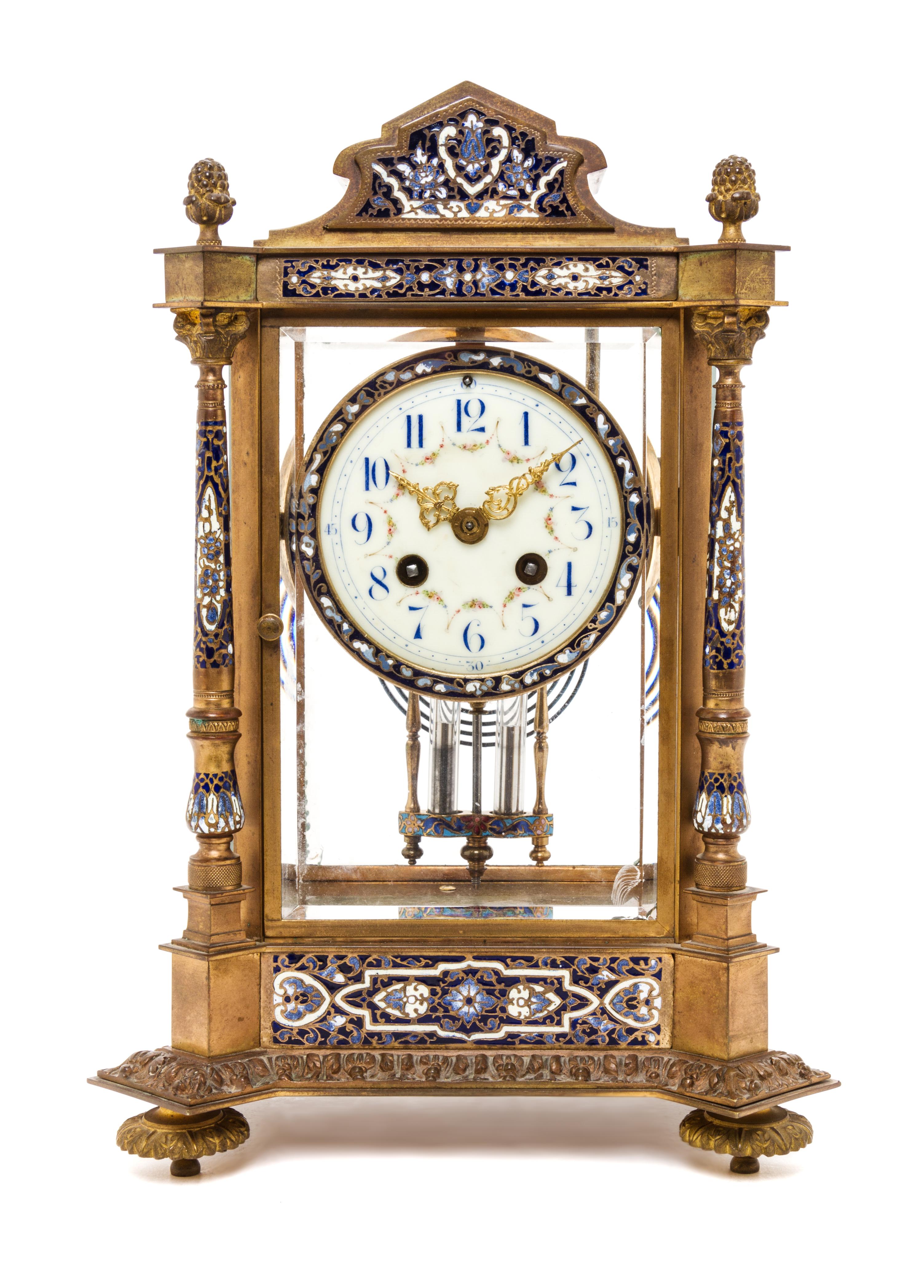 A French Gilt Bronze and Champleve Mantel Clock, Height 13 3/8 inches.