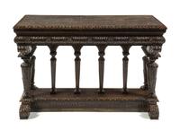 A Flemish Baroque Style Walnut Table Height 30 1/2 x width 47 x depth 24 1/2 inches. — 19TH CENTURY