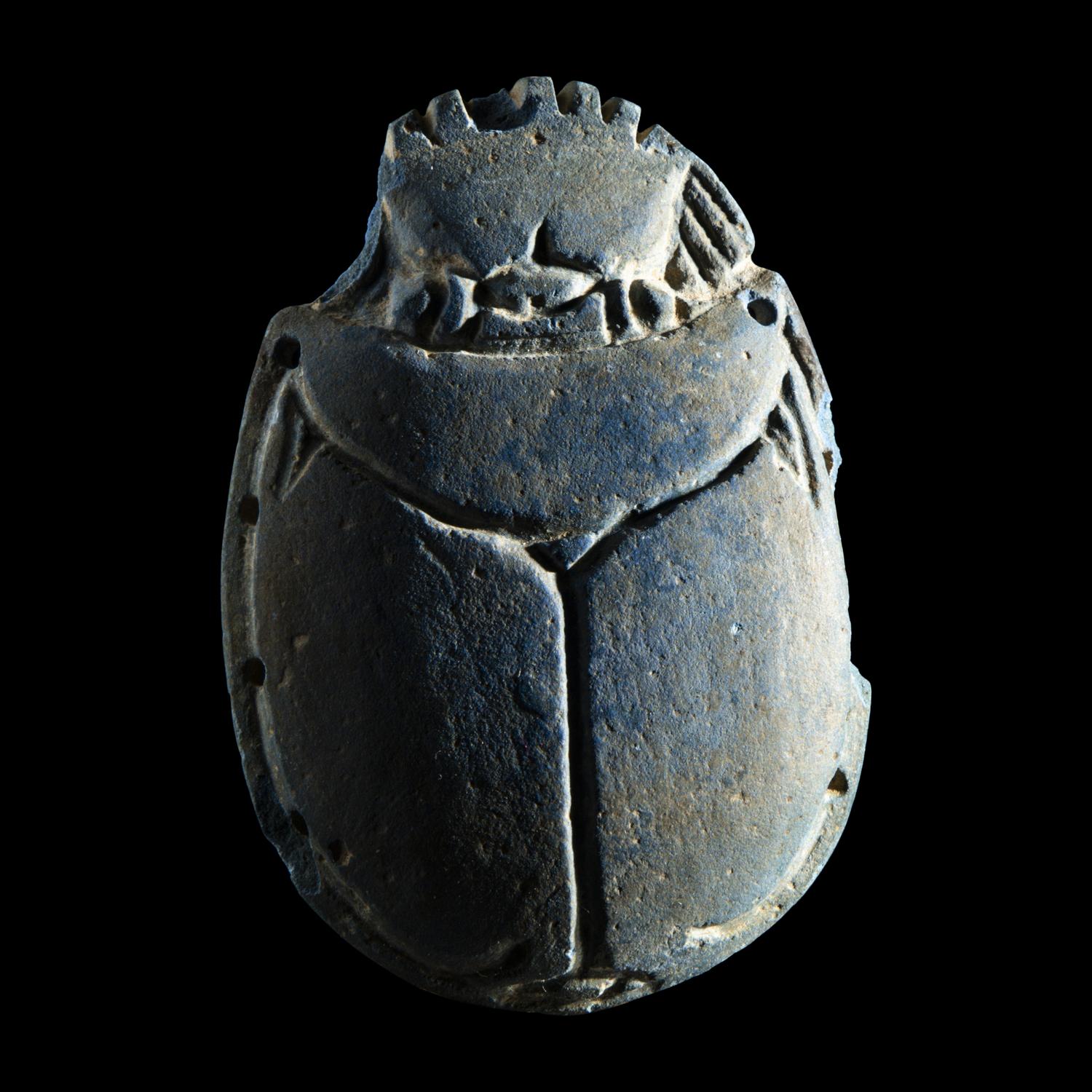 An Egyptian Faience Scarab