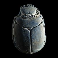 An Egyptian Faience Scarab