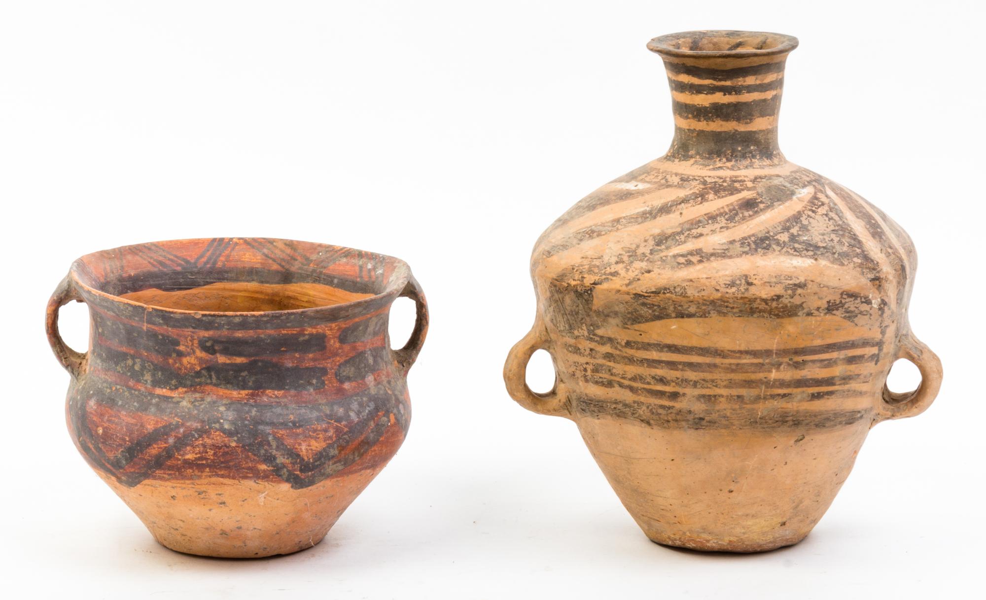 A Group of Six Neolithic Style Pottery Vessels Height of tallest 10 1/4 inches.