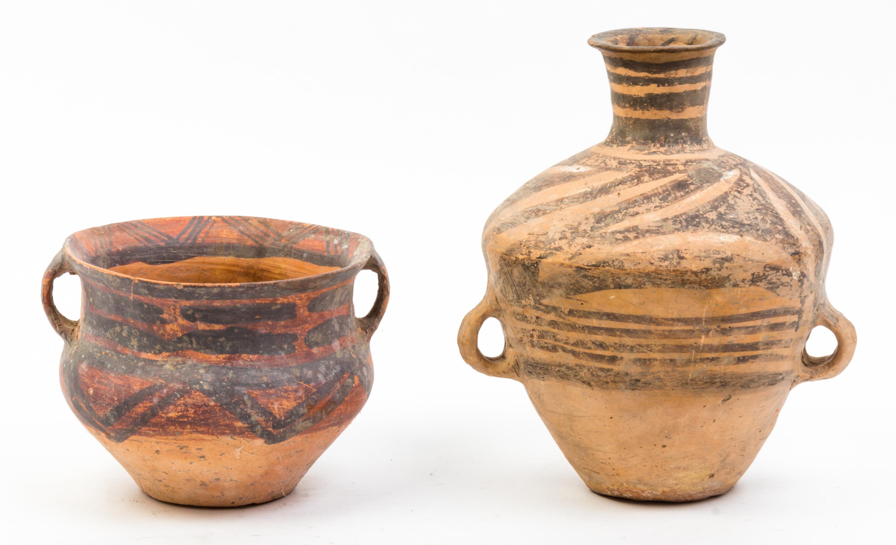 A Group of Six Neolithic Style Pottery Vessels Height of tallest 10 1/4 inches.