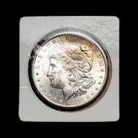 An 1883-CC Morgan $1 Coin