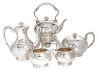 An English Silver-Plate Tea Service, Cooper Bros., Sheffield, comprising a kettle on stand, teapot, coffee pot, creamer, sugar, and was