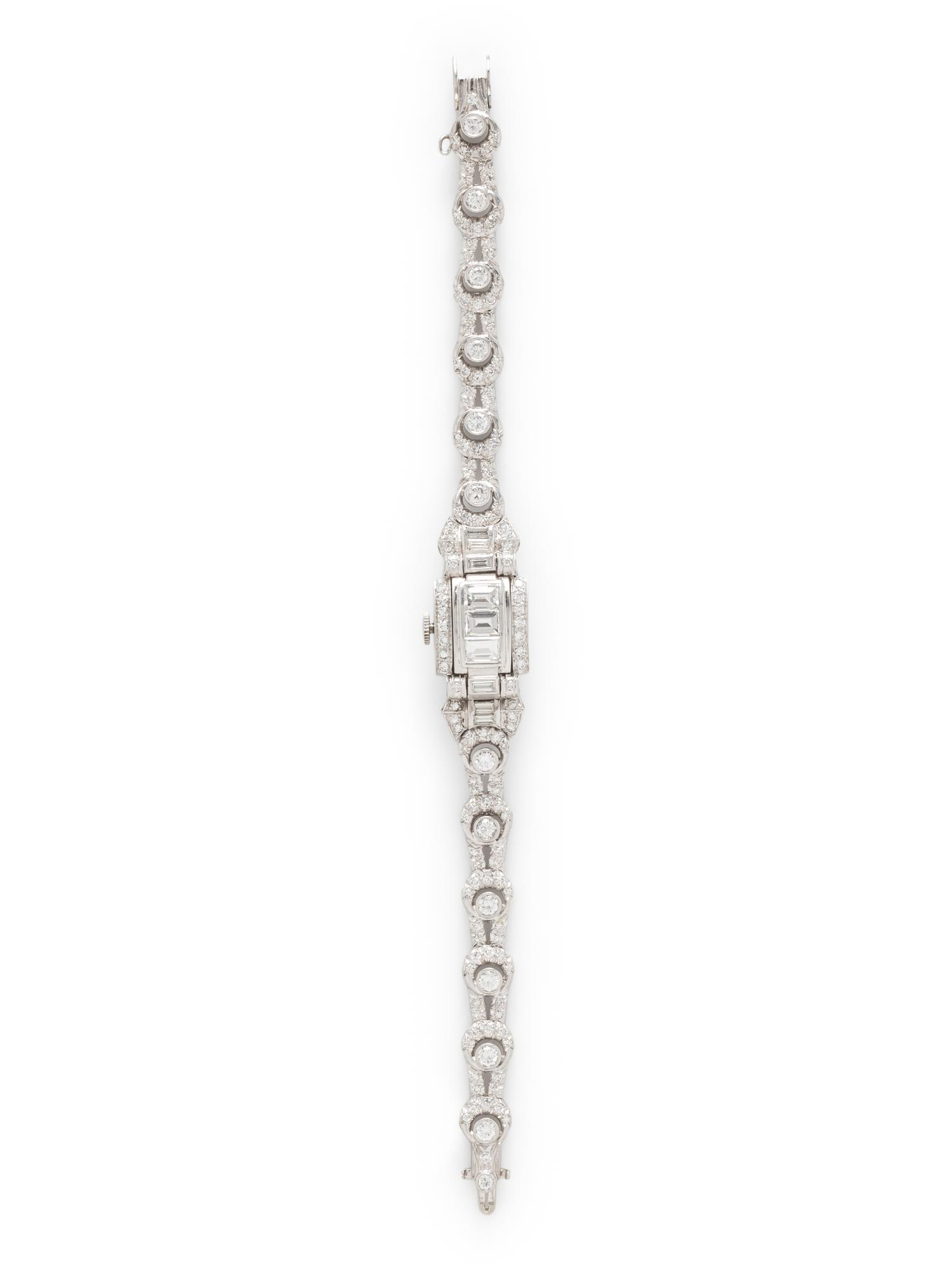 HAMILTON, PLATINUM AND DIAMOND SURPRISE WATCH