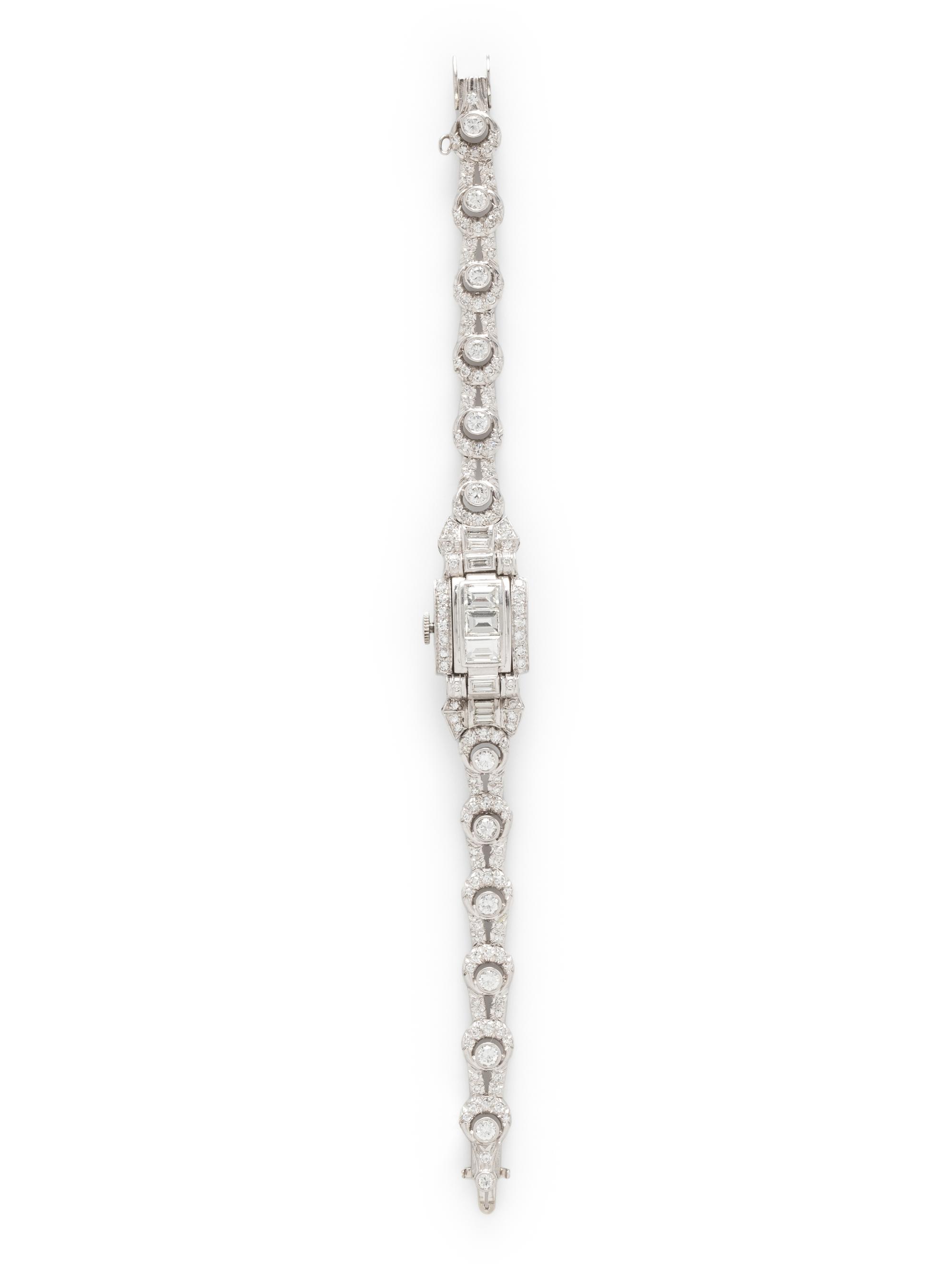 HAMILTON, PLATINUM AND DIAMOND SURPRISE WATCH