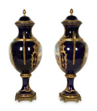 A Pair of Sèvres Style Porcelain Urns