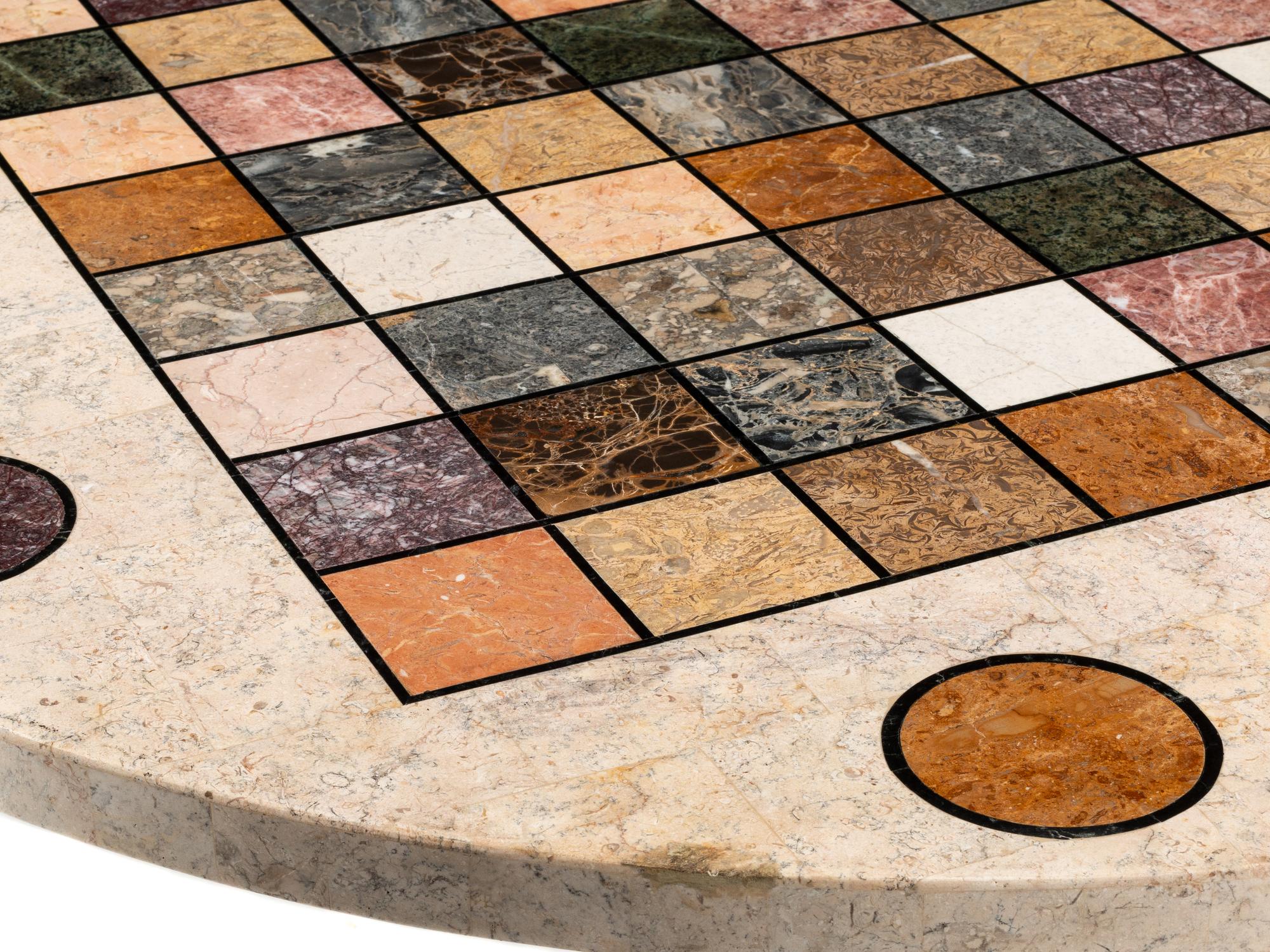 A Continental Parcel Gilt Specimen Marble Game Table