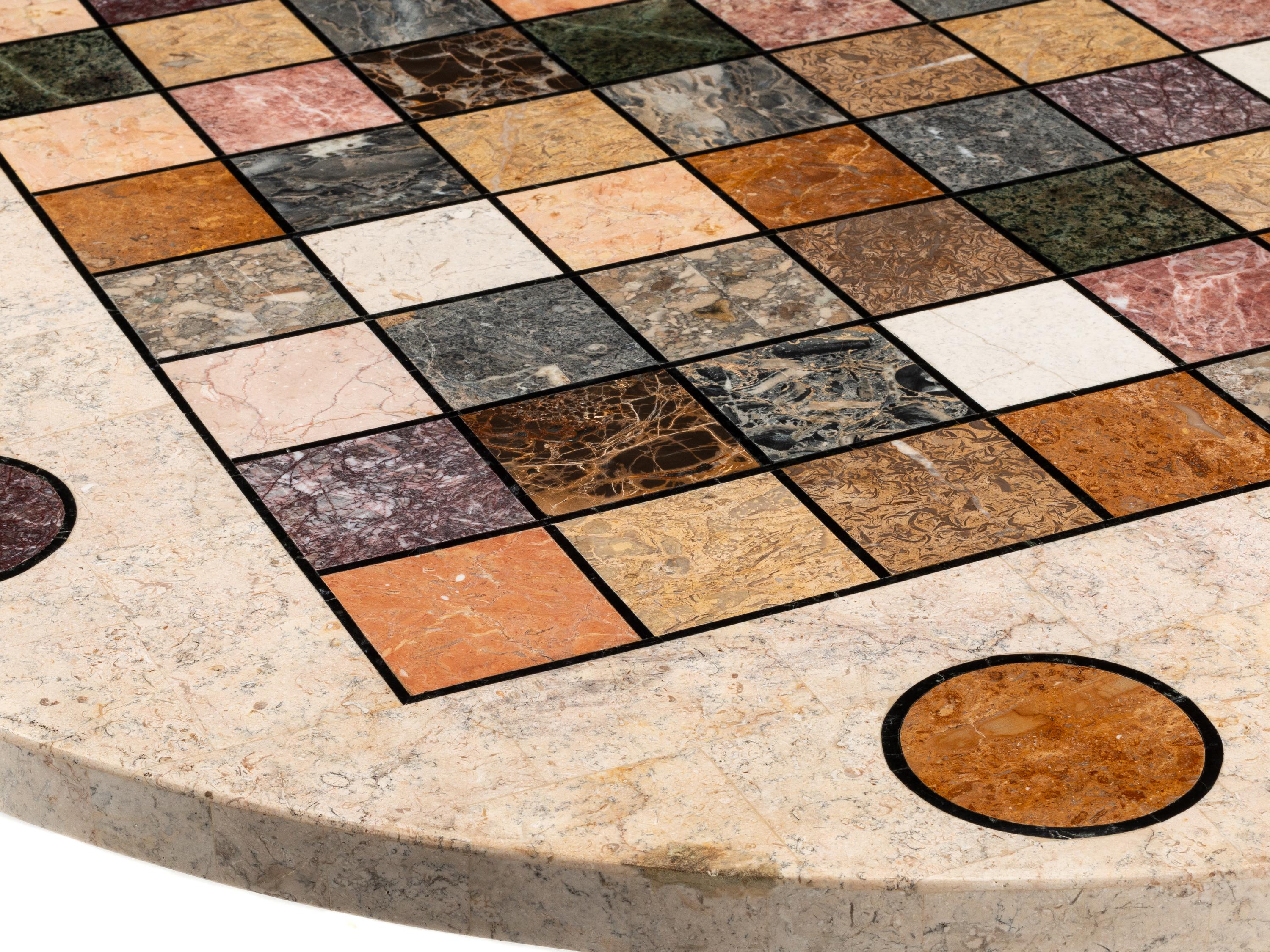 A Continental Parcel Gilt Specimen Marble Game Table
