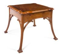 French, FIRST HALF 20TH CENTURY, an Art Nouveau style mahogany occasional table