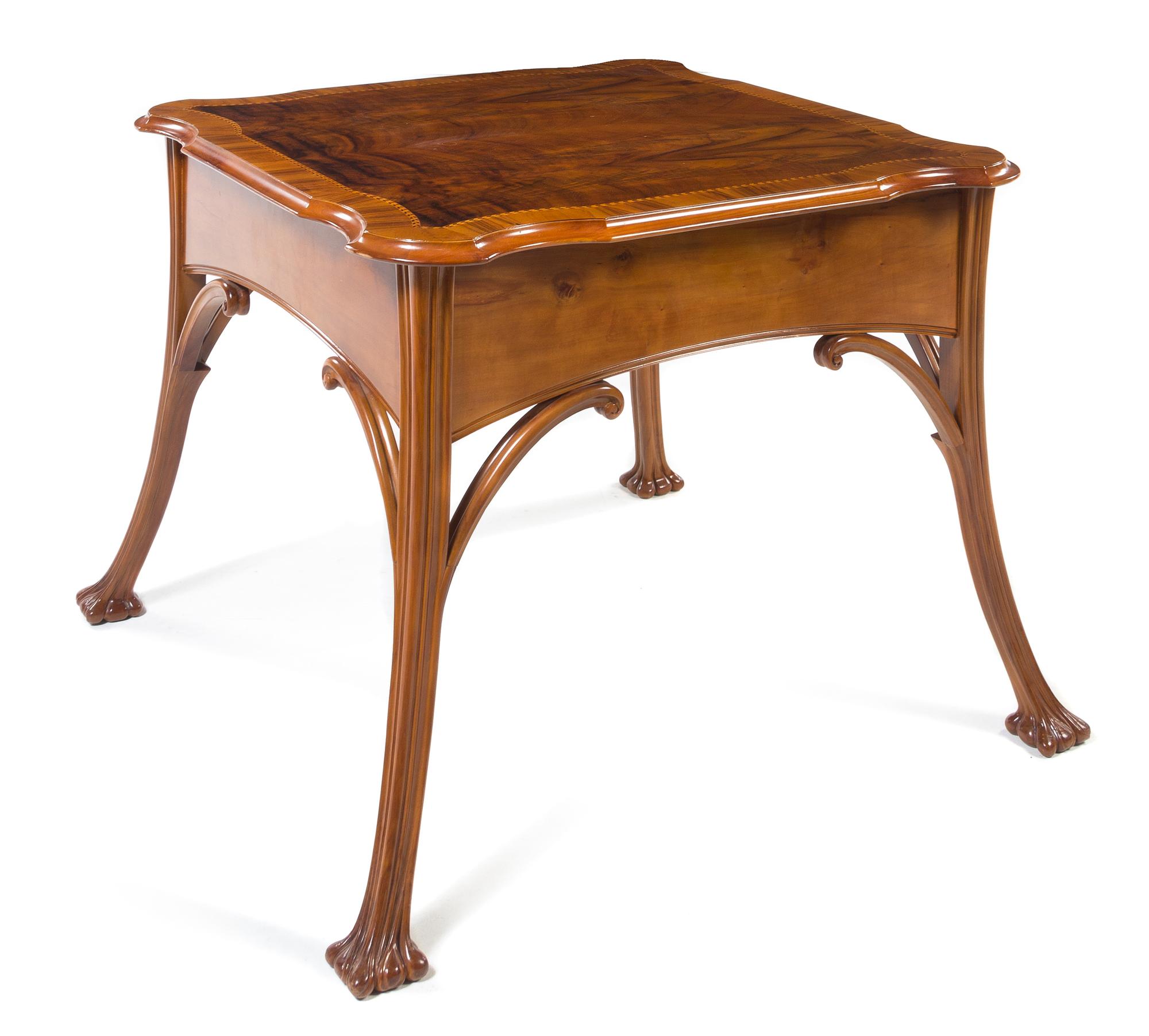 French, FIRST HALF 20TH CENTURY, an Art Nouveau style mahogany occasional table