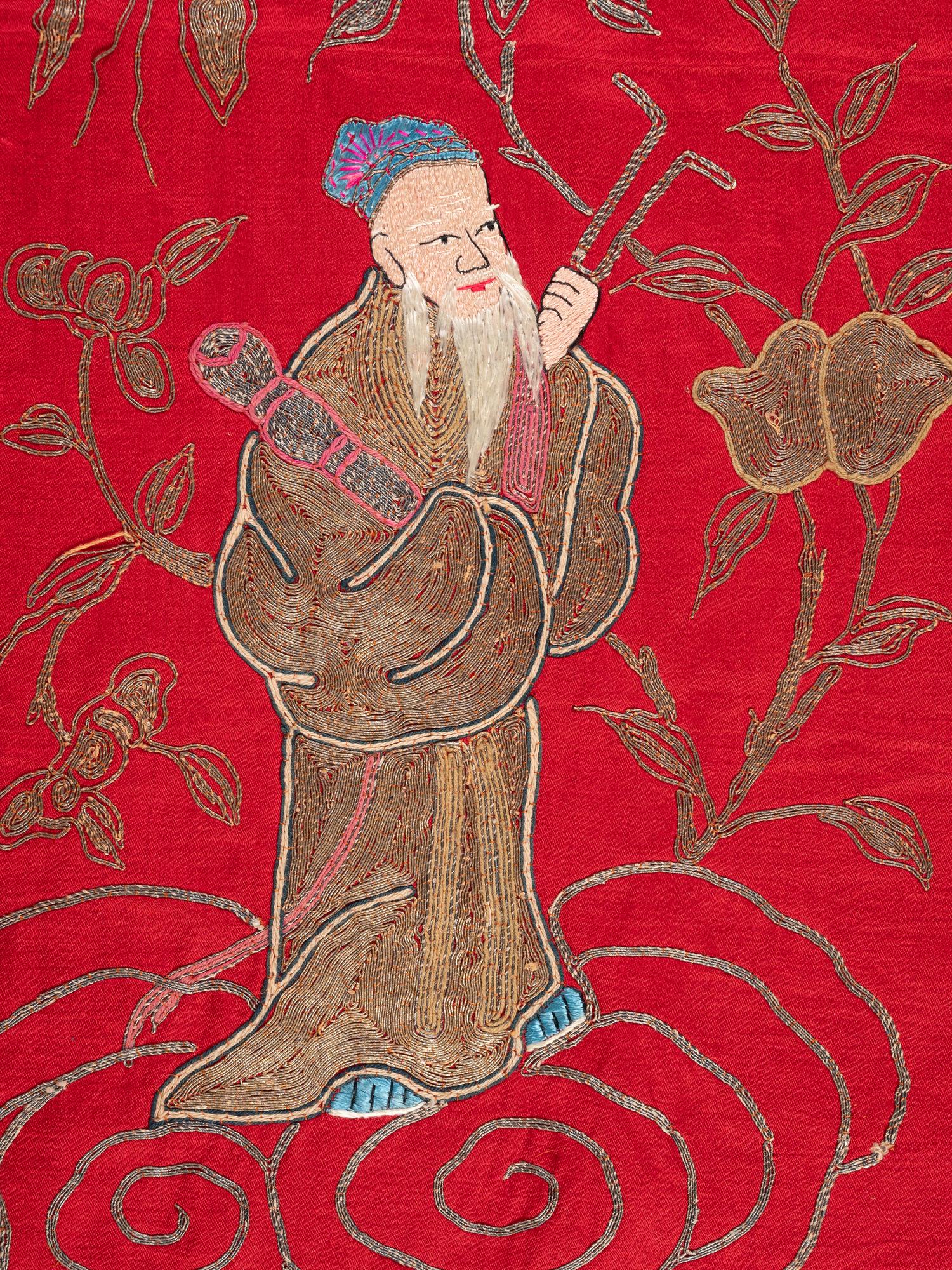 A Pair of Chinese Red Ground Embroidered Silk Panels