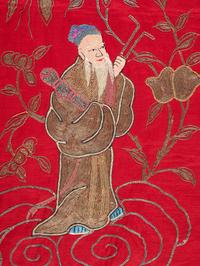 A Pair of Chinese Red Ground Embroidered Silk Panels