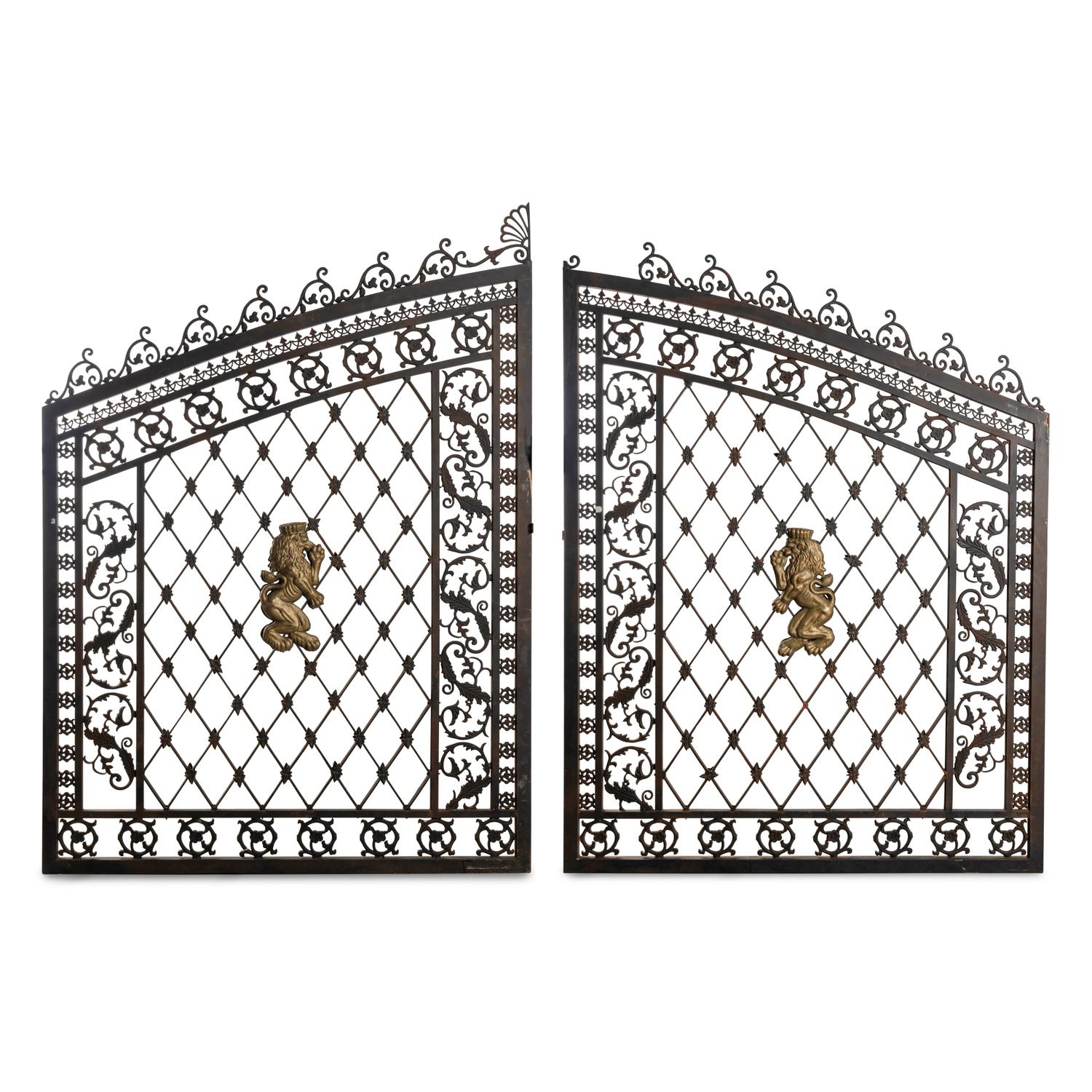 A Pair of Parcel Gilt Iron and Metal Lion-Decorated Gates