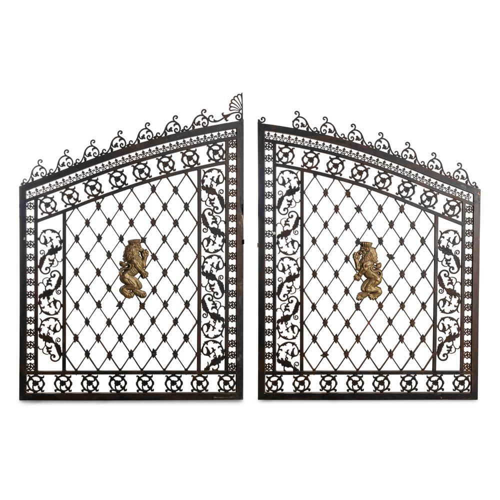 A Pair of Parcel Gilt Iron and Metal Lion-Decorated Gates