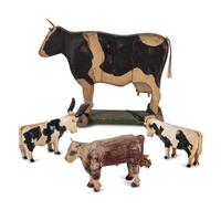 Four Carved Wood and Painted Folk Art Cows