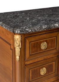 A Louis XV/XVI Transitional Gilt Bronze Mounted Walnut Marble-Top Commode