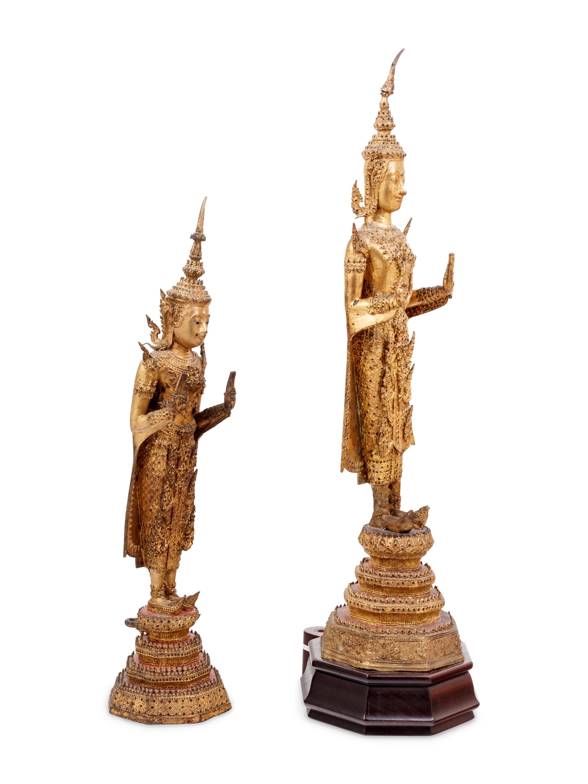 Two Thai Gilt Bronze Figures of Standing Buddha